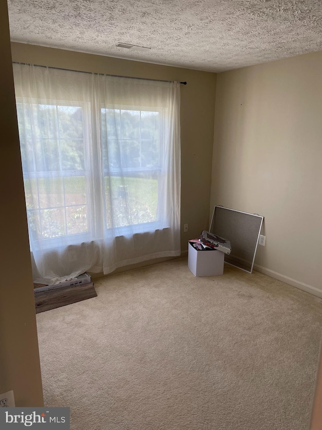 2974 Corona Ct, Manchester, MD 21102 - empty room with carpet flooring, a textured ceiling, and baseboards