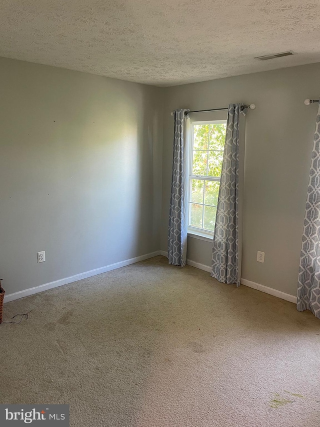 2974 Corona Ct, Manchester, MD 21102 - carpeted spare room with a textured ceiling and baseboards