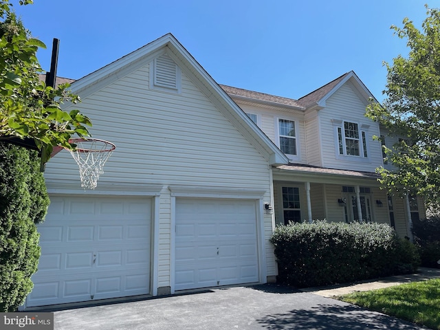 2974 Corona Ct, Manchester, MD 21102 - view of home's exterior featuring driveway, a garage, and a shingled roof