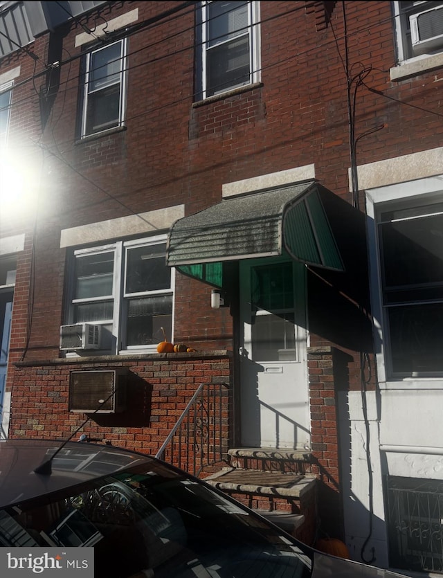 2024 S Bouvier St, Philadelphia, PA 19145 - view of side of home with brick siding and cooling unit
