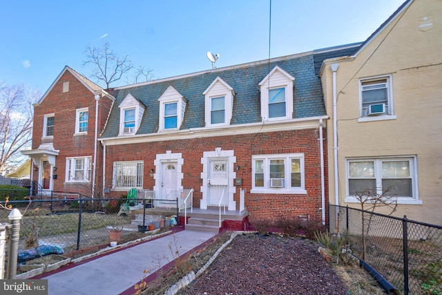 5317 7th St NW, Washington, DC 20011 - view of property with mansard roof, brick siding, a high end roof, and cooling unit