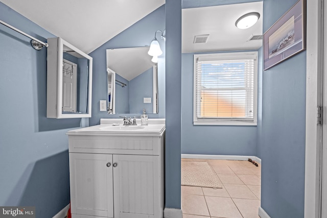 1224 Mercer Dr, Haddonfield, NJ 08033 - bathroom with vanity, tile patterned flooring, vaulted ceiling, and baseboards