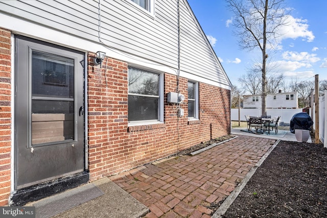 1224 Mercer Dr, Haddonfield, NJ 08033 - doorway to property featuring brick siding and a patio area
