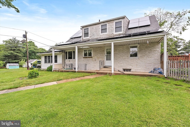 1010 Hampton Dr, Eastampton, NJ 08060 - view of front of property featuring solar panels, a porch, and brick siding