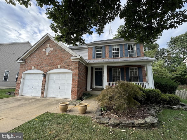 46825 Northbrook Way, Sterling, VA 20164 - traditional-style house featuring brick siding, an attached garage, driveway, and a porch