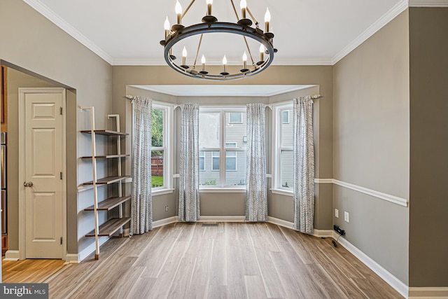 46825 Northbrook Way, Sterling, VA 20164 - unfurnished dining area featuring a chandelier, wood finished floors, ornamental molding, and baseboards