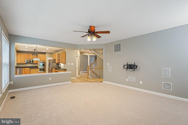 46825 Northbrook Way, Sterling, VA 20164 - unfurnished living room with a ceiling fan, light carpet, stairway, and recessed lighting