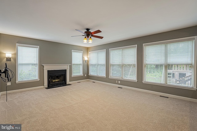 46825 Northbrook Way, Sterling, VA 20164 - unfurnished living room with baseboards, a ceiling fan, and carpet