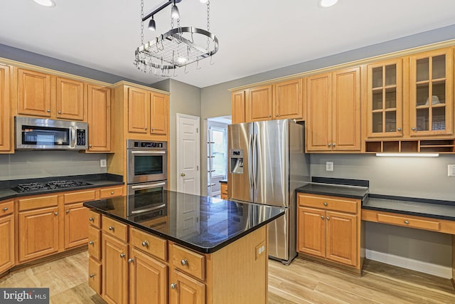 46825 Northbrook Way, Sterling, VA 20164 - kitchen featuring stainless steel appliances, light wood-style floors, a kitchen island, glass insert cabinets, and recessed lighting