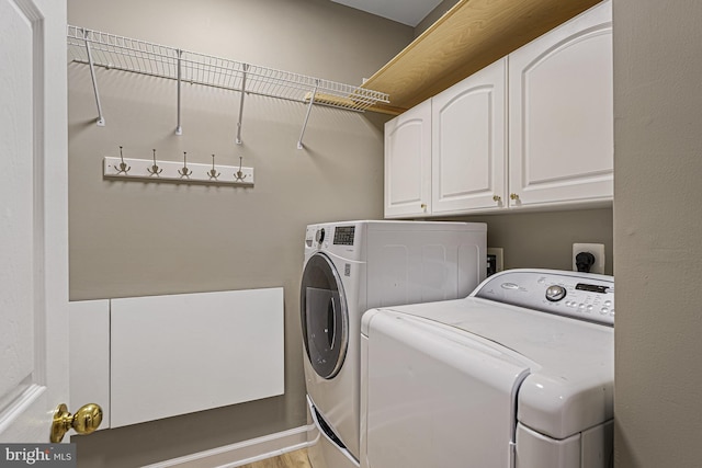46825 Northbrook Way, Sterling, VA 20164 - laundry room featuring independent washer and dryer and cabinet space