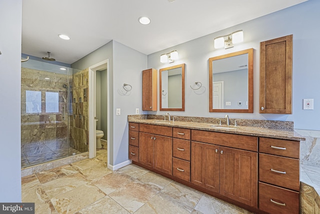 46825 Northbrook Way, Sterling, VA 20164 - full bath featuring double vanity, a stall shower, toilet, baseboards, and recessed lighting