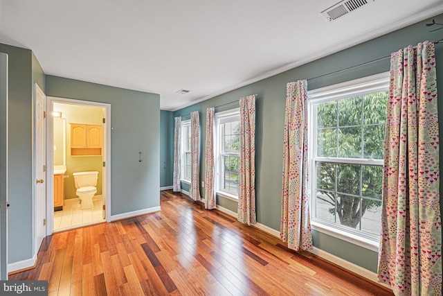 46825 Northbrook Way, Sterling, VA 20164 - empty room with light wood-style floors and baseboards