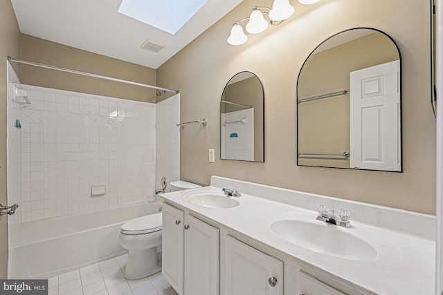 46825 Northbrook Way, Sterling, VA 20164 - full bathroom featuring a skylight, washtub / shower combination, toilet, double vanity, and tile patterned flooring