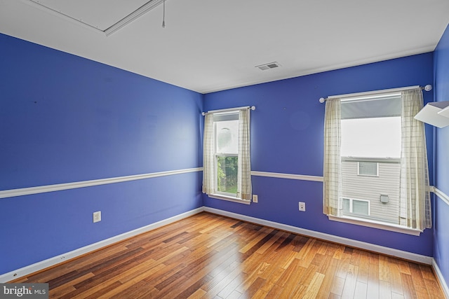 46825 Northbrook Way, Sterling, VA 20164 - empty room with baseboards, wood-type flooring, and attic access