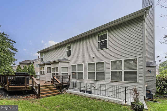 46825 Northbrook Way, Sterling, VA 20164 - rear view of house featuring a deck and a yard