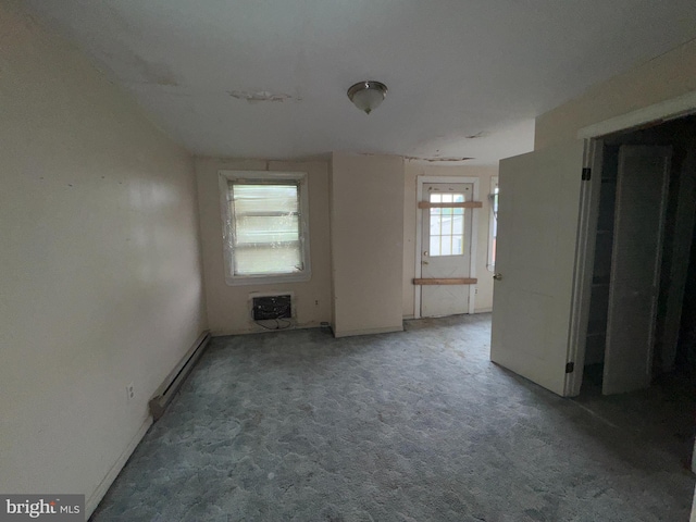 1515 N Franklin St, Wilmington, DE 19806 - empty room with heating unit, carpet floors, and baseboards
