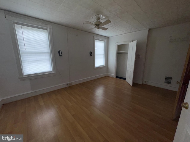 1515 N Franklin St, Wilmington, DE 19806 - unfurnished bedroom with light wood-style flooring, baseboards, a closet, and ceiling fan