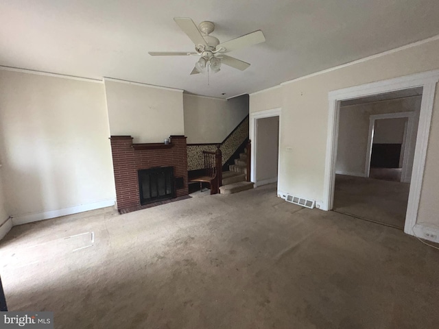 1515 N Franklin St, Wilmington, DE 19806 - unfurnished living room featuring carpet floors, a brick fireplace, a ceiling fan, stairway, and baseboards