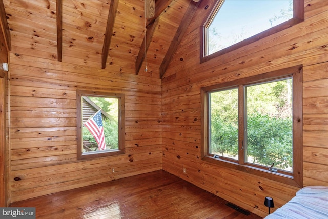 26 Wallamsey Ln, Chesapeake City, MD 21915 - unfurnished bedroom featuring wood finished floors, wood ceiling, and wooden walls