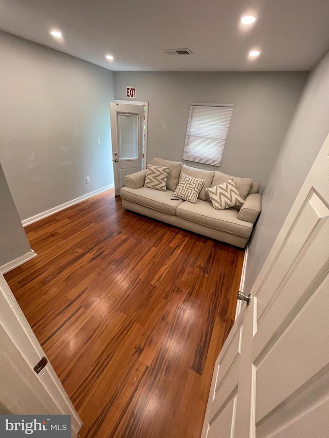 6108 Walnut St, Philadelphia, PA 19139 - living area featuring recessed lighting, wood finished floors, and baseboards