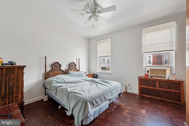 2024 Mifflin St, Philadelphia, PA 19145 - bedroom with baseboards, wood finished floors, a ceiling fan, and cooling unit