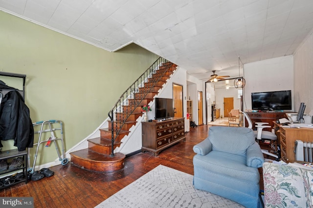 2024 Mifflin St, Philadelphia, PA 19145 - living area with stairs, ceiling fan, wood finished floors, and baseboards