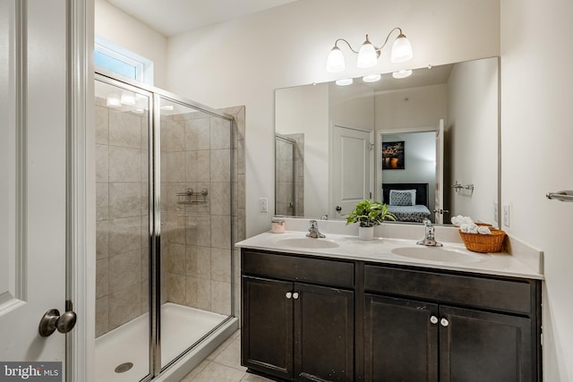 340 Dawson Pl, Downingtown, PA 19335 - bathroom featuring ensuite bathroom, a stall shower, double vanity, and tile patterned floors