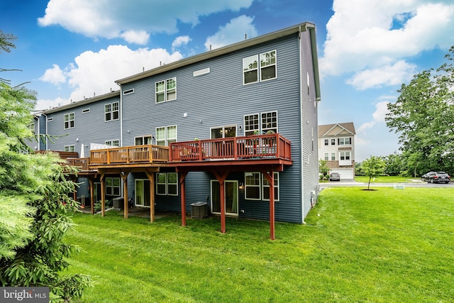 340 Dawson Pl, Downingtown, PA 19335 - rear view of house featuring a wooden deck, a lawn, and central AC