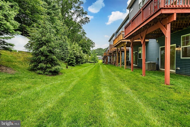340 Dawson Pl, Downingtown, PA 19335 - view of green lawn with a wooden deck and central AC