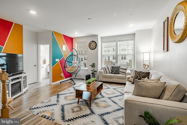 340 Dawson Pl, Downingtown, PA 19335 - living room with wood finished floors, recessed lighting, baseboards, and a glass covered fireplace
