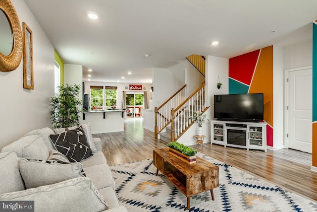 340 Dawson Pl, Downingtown, PA 19335 - living area featuring wood finished floors, stairs, recessed lighting, and baseboards