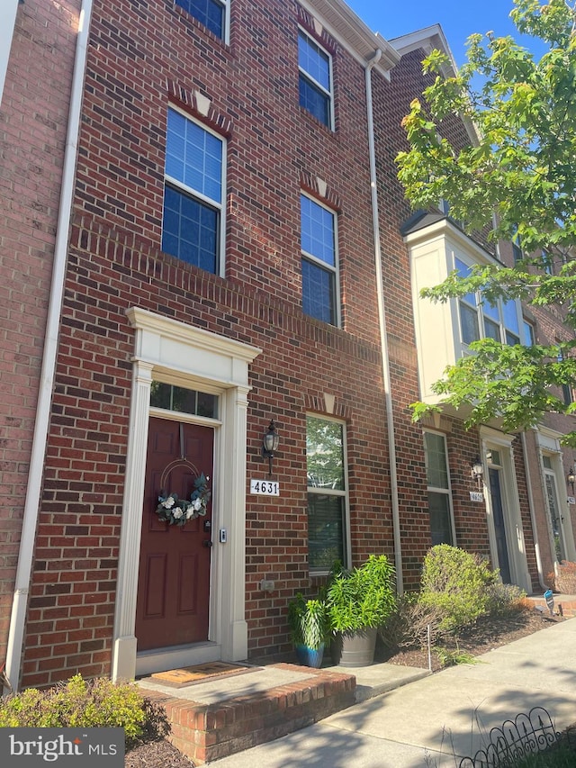 4631 Hudson St, Baltimore, MD 21224 - view of exterior entry featuring brick siding