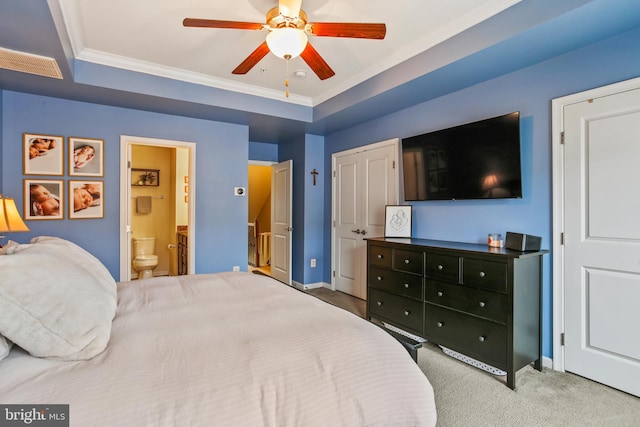 4631 Hudson St, Baltimore, MD 21224 - bedroom featuring carpet floors, crown molding, a tray ceiling, baseboards, and ensuite bath