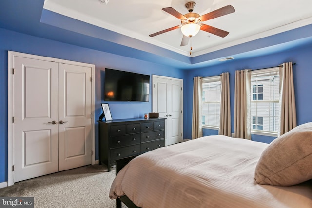 4631 Hudson St, Baltimore, MD 21224 - bedroom with two closets, carpet, ceiling fan, and crown molding