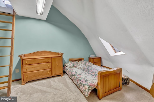 865 Windsor Perrineville Rd, East Windsor, NJ 08520 - bedroom with a skylight, carpet, vaulted ceiling, and baseboards