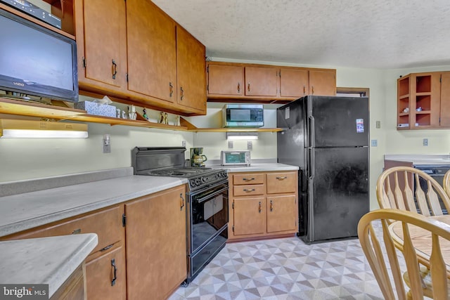 865 Windsor Perrineville Rd, East Windsor, NJ 08520 - kitchen featuring black appliances, open shelves, light countertops, light flooring, and a textured ceiling