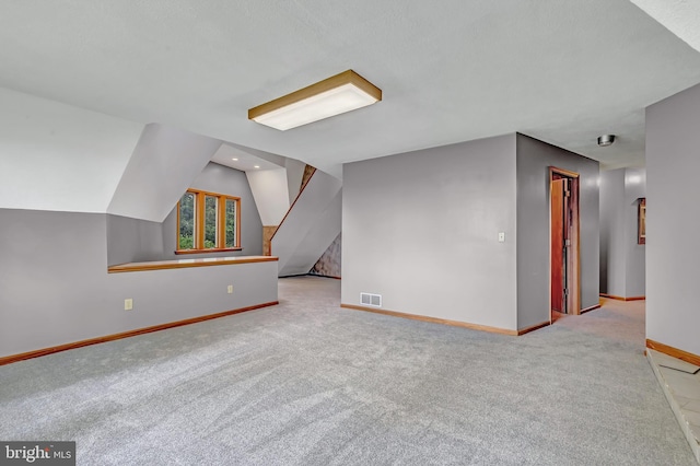 865 Windsor Perrineville Rd, East Windsor, NJ 08520 - bonus room featuring carpet, baseboards, and vaulted ceiling