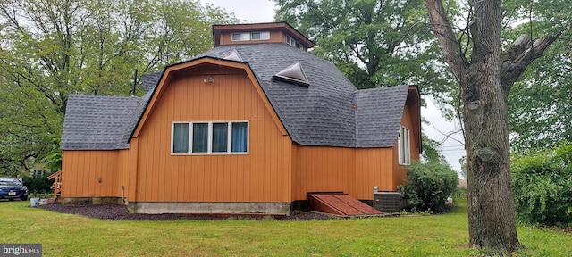 865 Windsor Perrineville Rd, East Windsor, NJ 08520 - view of home's exterior with roof with shingles, a gambrel roof, central AC, a yard, and a barn