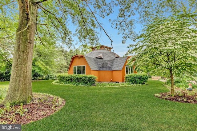 865 Windsor Perrineville Rd, East Windsor, NJ 08520 - view of property exterior with a shingled roof, a yard, and an outdoor structure