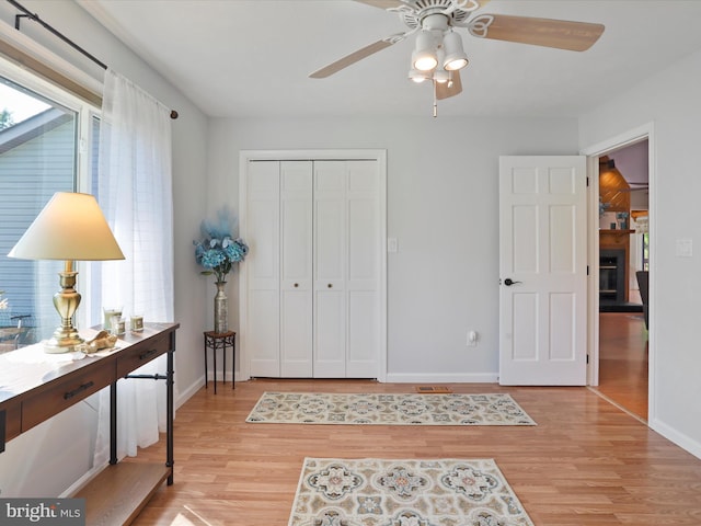 123 Windy Meadows Ct, Front Royal, VA 22630 - bedroom featuring light wood finished floors, baseboards, a closet, and ceiling fan