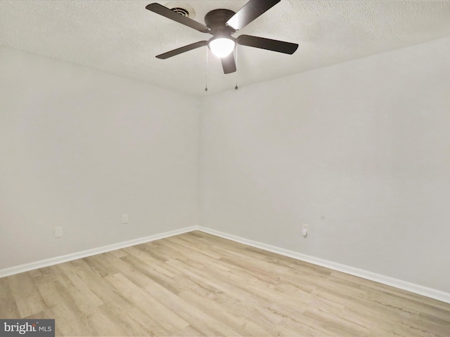 123 Windy Meadows Ct, Front Royal, VA 22630 - unfurnished room with light wood finished floors, a ceiling fan, baseboards, and a textured ceiling