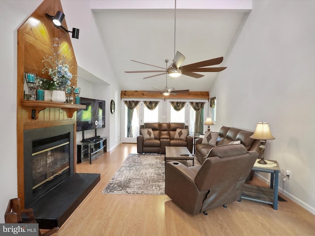 123 Windy Meadows Ct, Front Royal, VA 22630 - living area with ceiling fan, wood finished floors, baseboards, a fireplace, and high vaulted ceiling