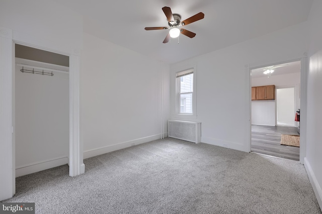 547 W Vine St, Lancaster, PA 17603 - unfurnished bedroom featuring radiator, carpet flooring, baseboards, and ceiling fan