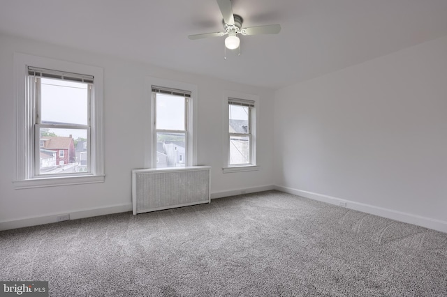 547 W Vine St, Lancaster, PA 17603 - carpeted empty room with radiator heating unit, a ceiling fan, and baseboards