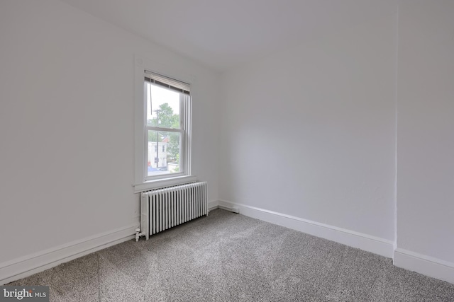 547 W Vine St, Lancaster, PA 17603 - empty room featuring radiator heating unit, carpet flooring, and baseboards