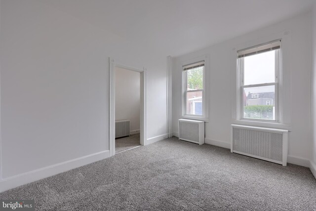 547 W Vine St, Lancaster, PA 17603 - unfurnished room with radiator heating unit, radiator, carpet floors, and baseboards