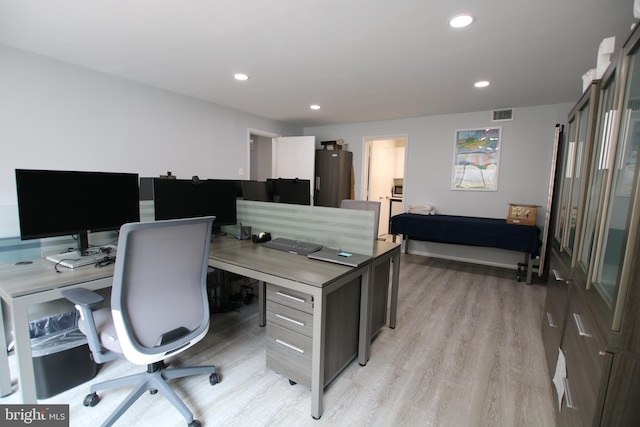 1325 18th St NW Unit Rp-105, Washington, DC 20036 - office featuring light wood-style flooring, water heater, and recessed lighting