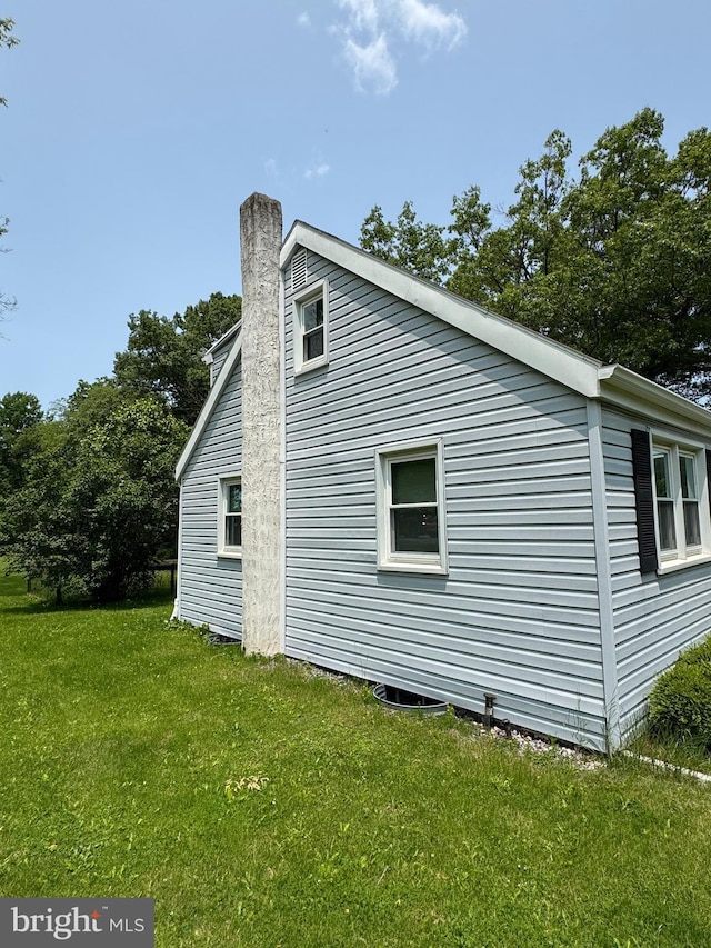 1238 Fox Hill Rd, State College, PA 16803 - view of side of property featuring a yard and a chimney