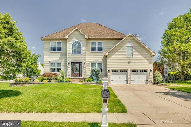 8 Adams Ln, Hainesport, NJ 08036 - colonial inspired home featuring an attached garage, driveway, and a chimney