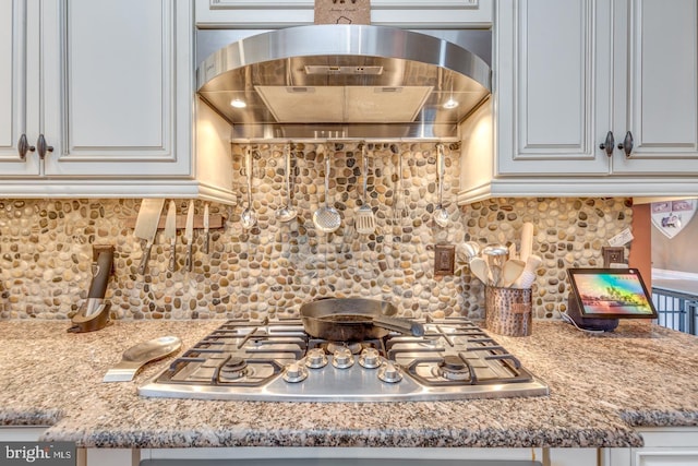 8 Adams Ln, Hainesport, NJ 08036 - kitchen with stainless steel gas cooktop, wall chimney exhaust hood, tasteful backsplash, and light stone countertops